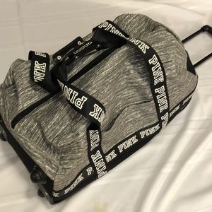 Vs pink duffle rolling luggage bag